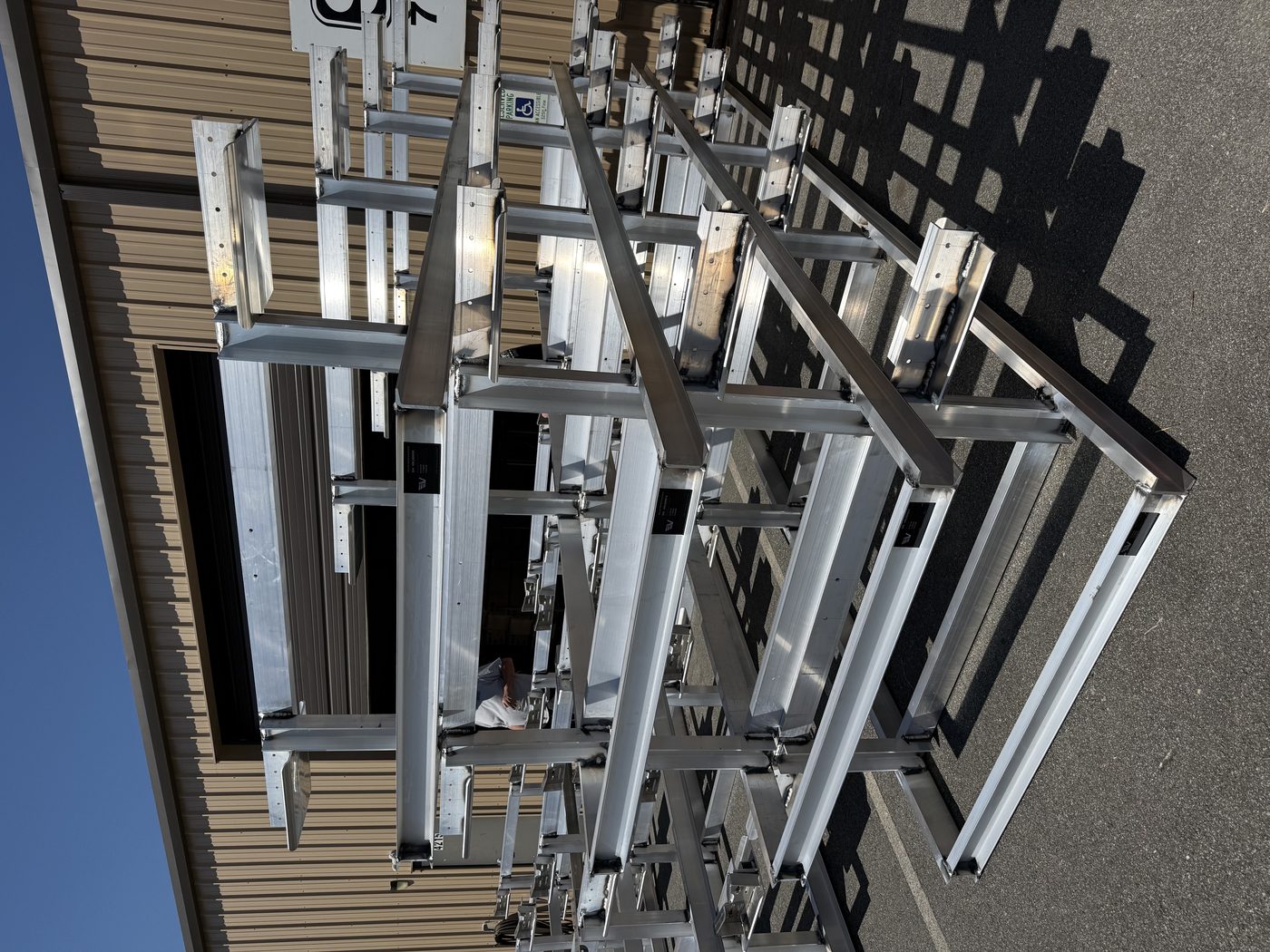 Serialized Veeline aluminum pontoon cradles stacked with capacity plates