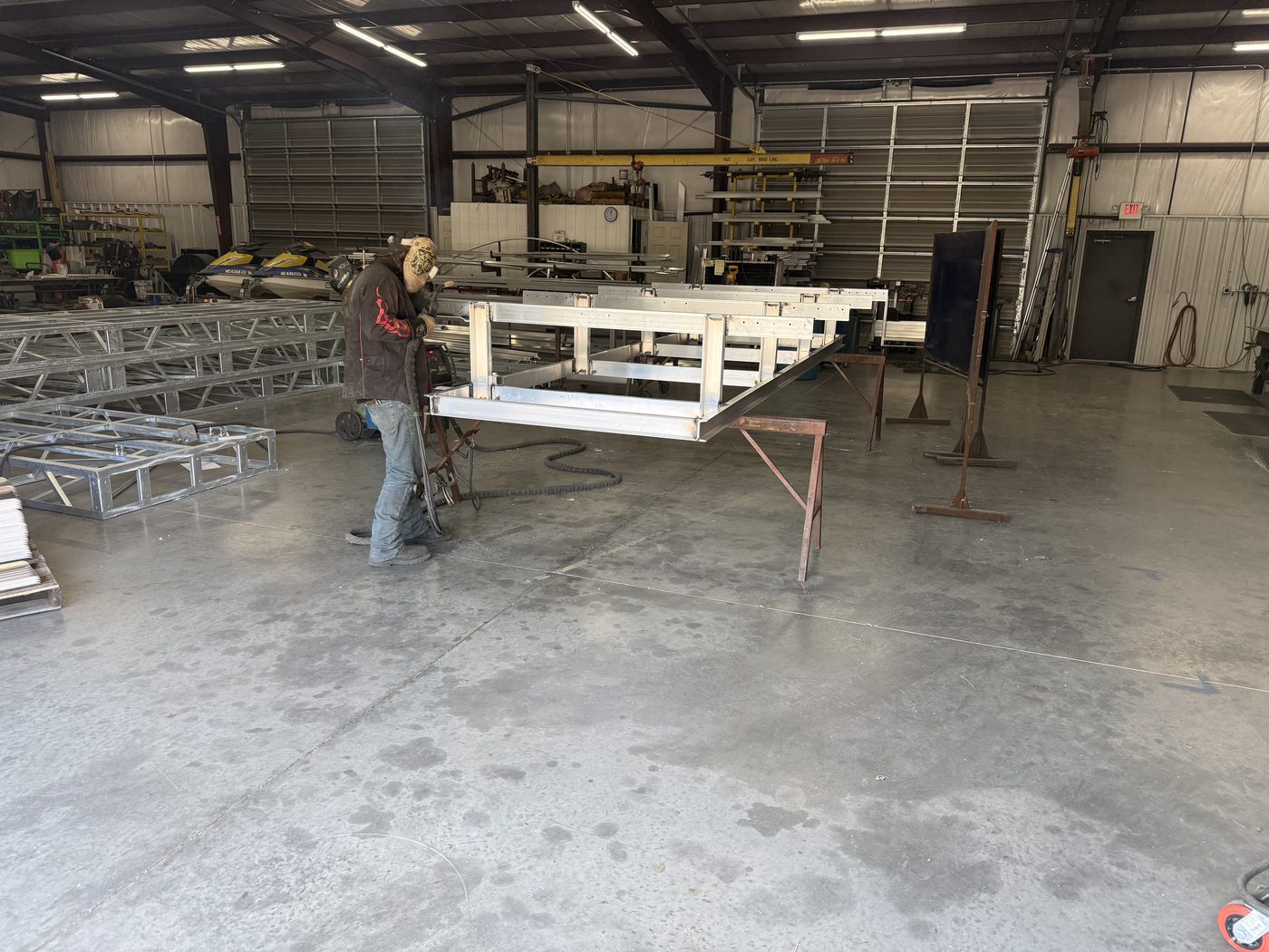 Welder fabricating a Veeline cradle in the Lincolnton, NC shop